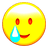 smilingFaceWithTear